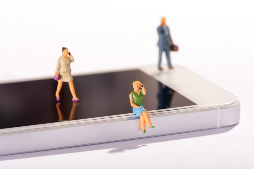 Miniature_People_On_Smartphone_original_485135_1747754474-1024x683 Contact Us